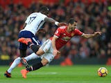 Moussa Sissoko and Henrikh Mkhitaryan in action during the Premier League game between Manchester United and Tottenham Hotspur on October 28, 2017