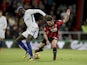 A blue-locked Tiemoue Bakayoko and Lewis Cook in action during the Premier League game between Bournemouth and Chelsea on October 28, 2017