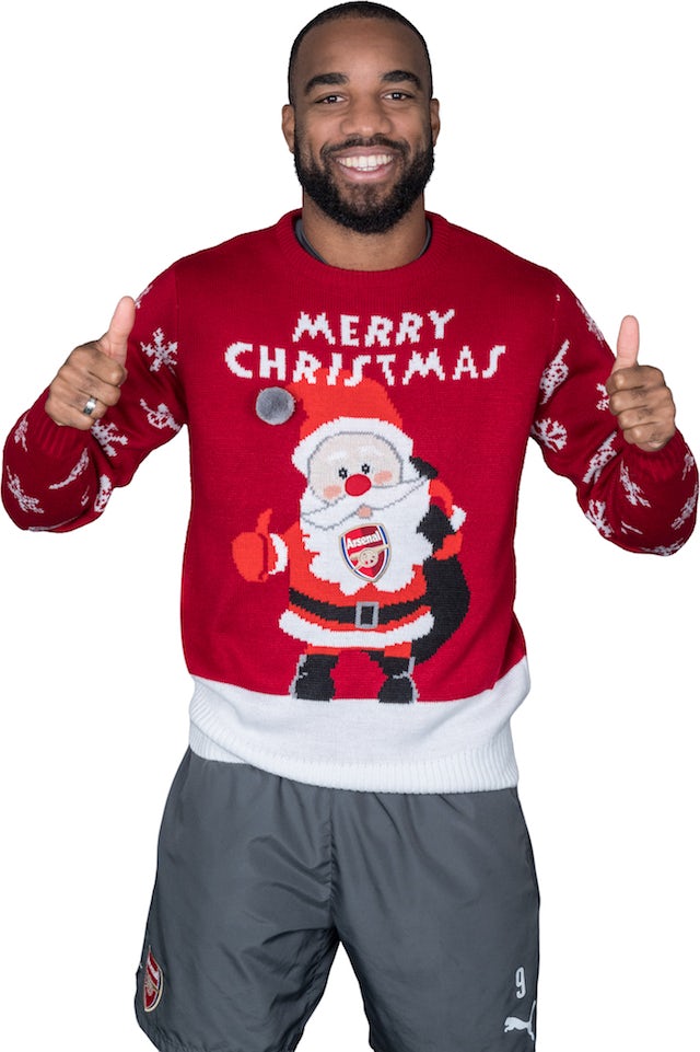 Alexandre Lacazette poses for the Save The Children's Christmas Jumper Day