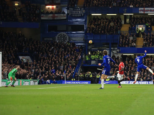 Alvaro Morata scores the opener during the Premier League game between Chelsea and Manchester United on November 5, 2017