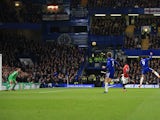 Alvaro Morata scores the opener during the Premier League game between Chelsea and Manchester United on November 5, 2017