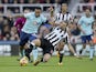 Bournemouth striker Callum Wilson holds off the challenge of Newcastle United defenders Florian Lejeune during their Premier League clash at St James' Park on November 4, 2017