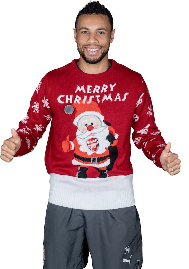 Francis Coquelin poses for the Save The Children's Christmas Jumper Day