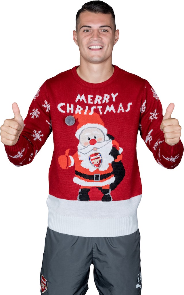 Granit Xhaka poses for the Save The Children's Christmas Jumper Day