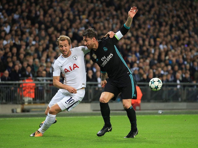 Harry Kane and Sergio Ramos grapple during the Champions League group game between Tottenham Hotspur and Real Madrid on November 1, 2017