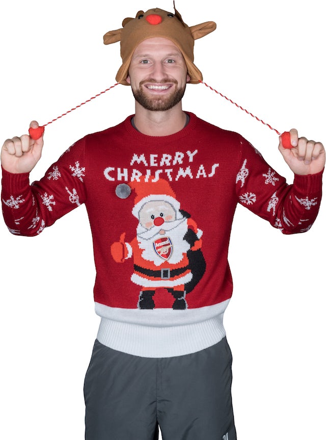 Shkodran Mustafi poses for the Save The Children's Christmas Jumper Day