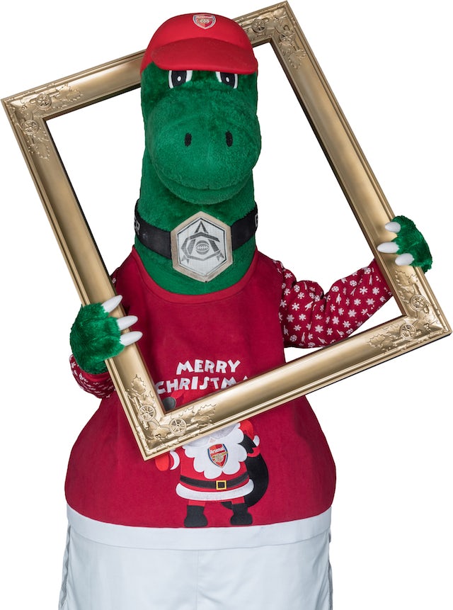 The Gunnersaurus poses for the Save The Children's Christmas Jumper Day