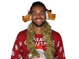 Theo Walcott dons his Christmas jumper - NOT FOR GENERAL USE