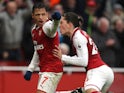 Alexis Sanchez celebrates scoring with Hector Bellerin during the Premier League game between Arsenal and Tottenham Hotspur on November 18, 2017