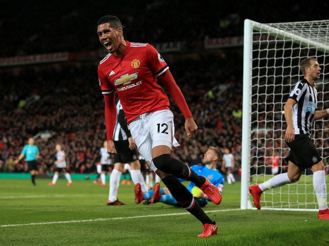 Chris Smalling celebrates scoring during the Premier League game between Manchester United and Newcastle United on November 18, 2017