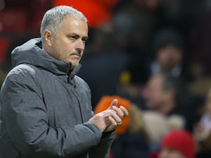 Jose Mourinho applauds during the Premier League game between Manchester United and Newcastle United on November 18, 2017