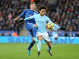 Marc Albrighton and Leroy Sane in action during the Premier League game between Leicester City and Manchester City on November 18, 2017