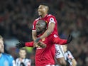 Romelu Lukaku celebrates scoring with Antonio Valencia during the Premier League game between Manchester United and Newcastle United on November 18, 2017