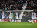Baggies players looking dejected after conceding a third during the Premier League game between West Bromwich Albion and Chelsea on November 18, 2017