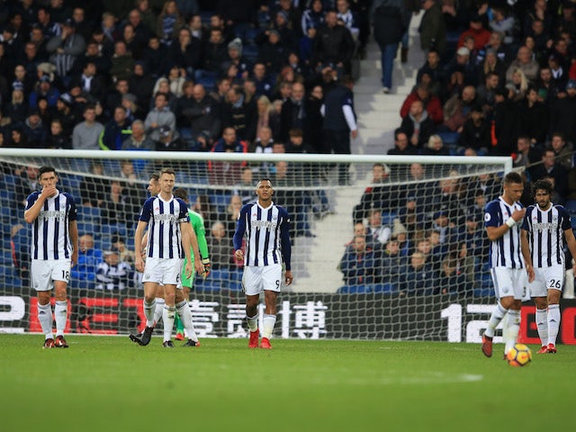 Baggies players looking dejected after conceding a third during the Premier League game between West Bromwich Albion and Chelsea on November 18, 2017