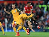 Anthony Martial collides with Shane Duffy during the Premier League game between Manchester United and Brighton & Hove Albion on November 25, 2017