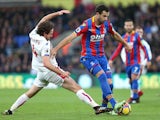 Joe Allen and Luka Milivojevic in action during the Premier League game between Crystal Palace and Stoke City on November 25, 2017