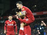 Mohamed Salah with Philippe Coutinho after scoring during the Premier League game between Liverpool and Chelsea on November 25, 2017