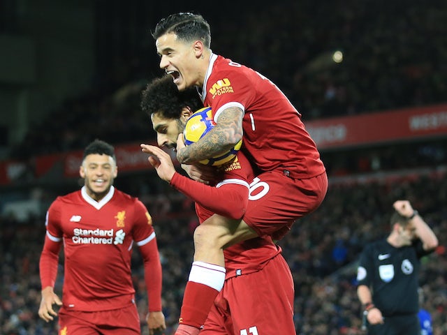 Mohamed Salah with Philippe Coutinho after scoring during the Premier League game between Liverpool and Chelsea on November 25, 2017