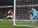 Alexandre Lacazette pulls one back during the Premier League game between Arsenal and Manchester United on December 2, 2017
