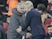 Arsene Wenger and Jose Mourinho share a tentative handshake during the Premier League game between Arsenal and Manchester United on December 2, 2017