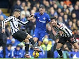 Ayoze Perez and Mikel Merino close in on Danny Drinkwater during the Premier League game between Chelsea and Newcastle United on December 2, 2017