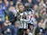 Dwight Gayle celebrates with Mohamed Diame after scoring during the Premier League game between Chelsea and Newcastle United on December 2, 2017