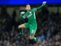 Ederson celebrates City's equaliser during the Premier League game between Manchester City and West Ham United on December 3, 2017