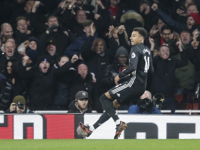 Jesse Lingard celebrates scoring the second during the Premier League game between Arsenal and Manchester United on December 2, 2017