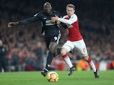Romelu Lukaku and Aaron Ramsey in action during the Premier League game between Arsenal and Manchester United on December 2, 2017