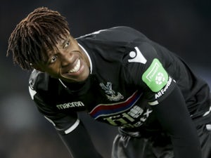 Zaha facing spell out with knee injury?