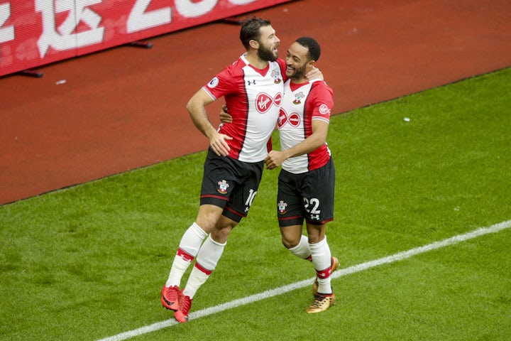 Charlie Austin celebrates with Nathan Redmond after scoring during the Premier League game between Southampton and Arsenal on December 10, 2017