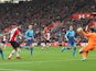 Charlie Austin scores the opener during the Premier League game between Southampton and Arsenal on December 10, 2017
