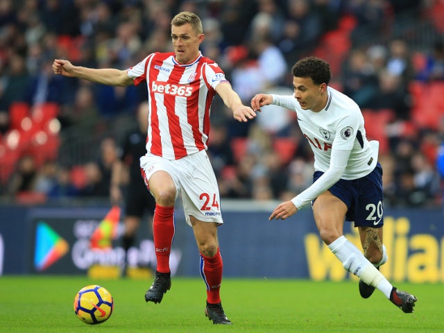 Dele Alli and Darren Fletcher during the Premier League match between Tottenham Hotspur and Stoke City on December 9, 2017