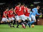 Kevin De Bruyne is marked by United's starting XI during the Premier League game between Manchester United and Manchester City on December 10, 2017