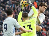 Marcos Alonso elbows Adrian during the Premier League game between West Ham United and Chelsea on December 9, 2017
