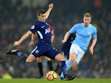 Harry Winks and Kevin De Bruyne in action during the Premier League game between Manchester City and Tottenham Hotspur on December 16, 2017