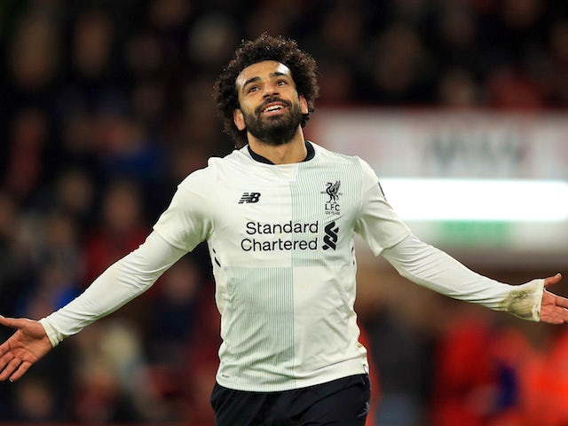 Mohamed Salah celebrates scoring during the Premier League game between Bournemouth and Liverpool on December 17, 2017