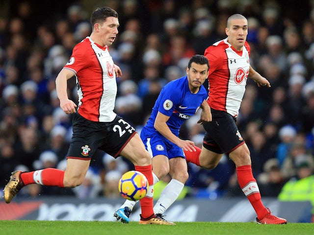 Pedro, Oriol Romeu and Pierre-Emile Hojbjerg in action during the Premier League game between Chelsea and Southampton on December 16, 2017