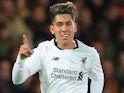 Roberto Firmino celebrates scoring the fourth during the Premier League game between Bournemouth and Liverpool on December 17, 2017