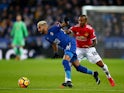 Riyad Mahrez and Ashley Young during the Premier League match between Leicester City and Manchester United on December 23, 2017