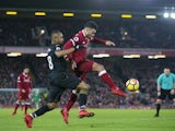 Alex Oxlade-Chamberlain en route to score during the Premier League game between Liverpool and Swansea City on December 26, 2017