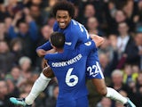 Danny Drinkwater celebrates with Willian after scoring the second during the Premier League game between Chelsea and Stoke City on December 30, 2017