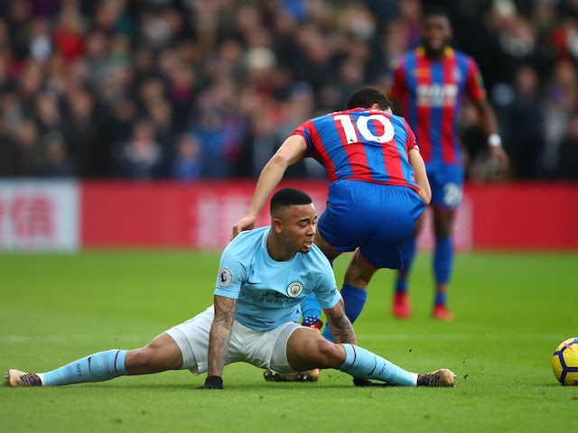 Gabriel Jesus and Andros Townsend in action during the Premier League game between Crystal Palace and Manchester City on December 31, 2017