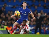 Gary Cahill looms over Saido Berahino during the Premier League game between Chelsea and Stoke City on December 30, 2017