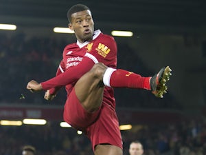 Georginio Wijnaldum has a shot during the Premier League game between Liverpool and Swansea City on December 26, 2017