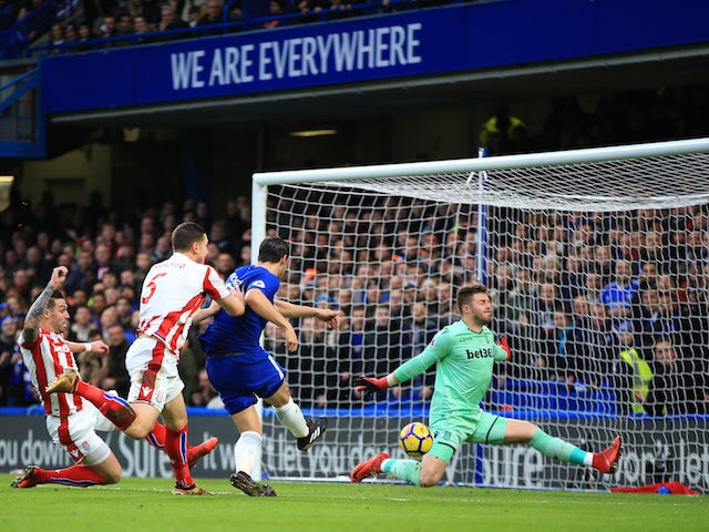 Jack Butland saves Alvaro Morata's shot during the Premier League game between Chelsea and Stoke City on December 30, 2017