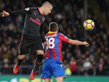 Jack Wilshere and James McArthur in action during the Premier League game between Crystal Palace and Arsenal on December 28, 2017