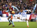 Jeff Hendrick and Rajiv van La Parra in action during the Premier League game between Huddersfield Town and Burnley on December 30, 2017