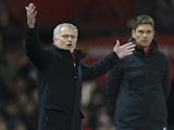 Jose Mourinho reacts as Mauricio Pellegrino watches on during the Premier League game between Manchester United and Southampton on December 30, 2017